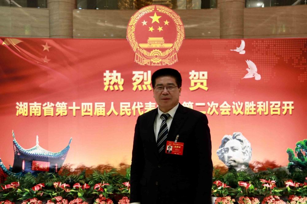 湖南省人大代表、国家税务总局湖南省税务局党委书记、局长曾光辉。人民网记者 吴茜薇摄